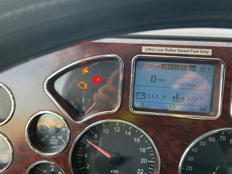 With the read outs available in the co-pilot, you can get the codes, or sometimes identify the problem through the gauges available in the center screen on the dash, above the speedo and tach. . Mack dump truck lightning bolt on dash